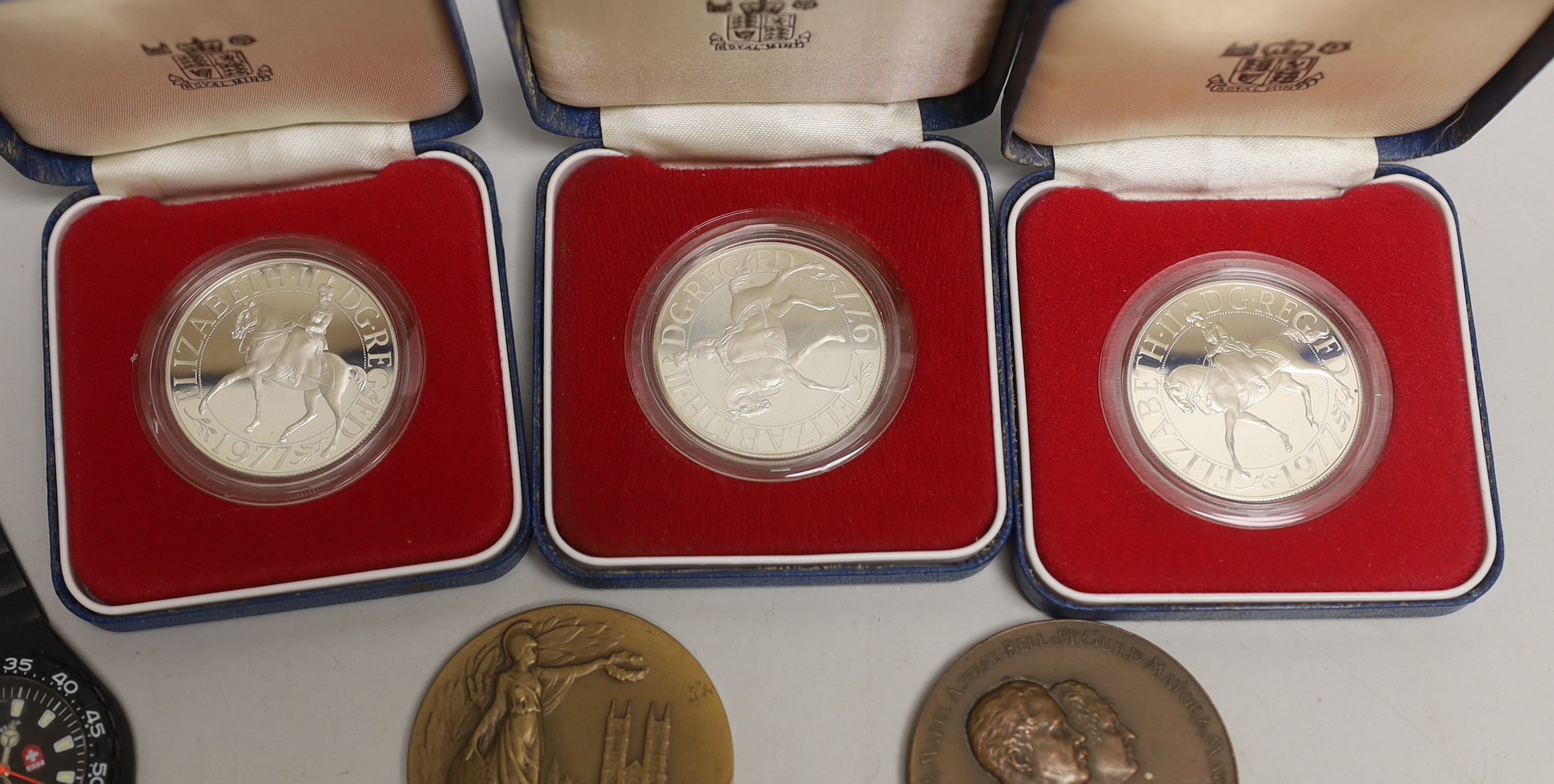 Three cased proof silver 1977 crowns, and various commemorative medals